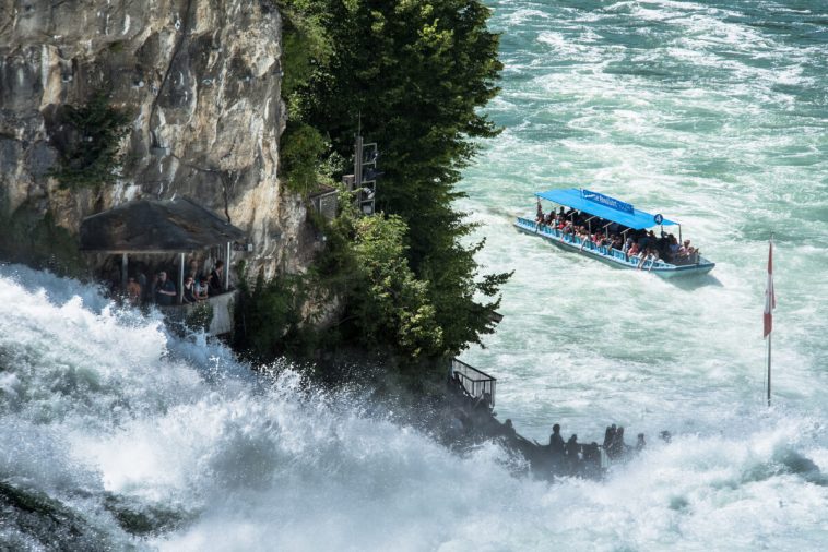 Switzerland best things to do: Take a boat ride in the RheinFalls