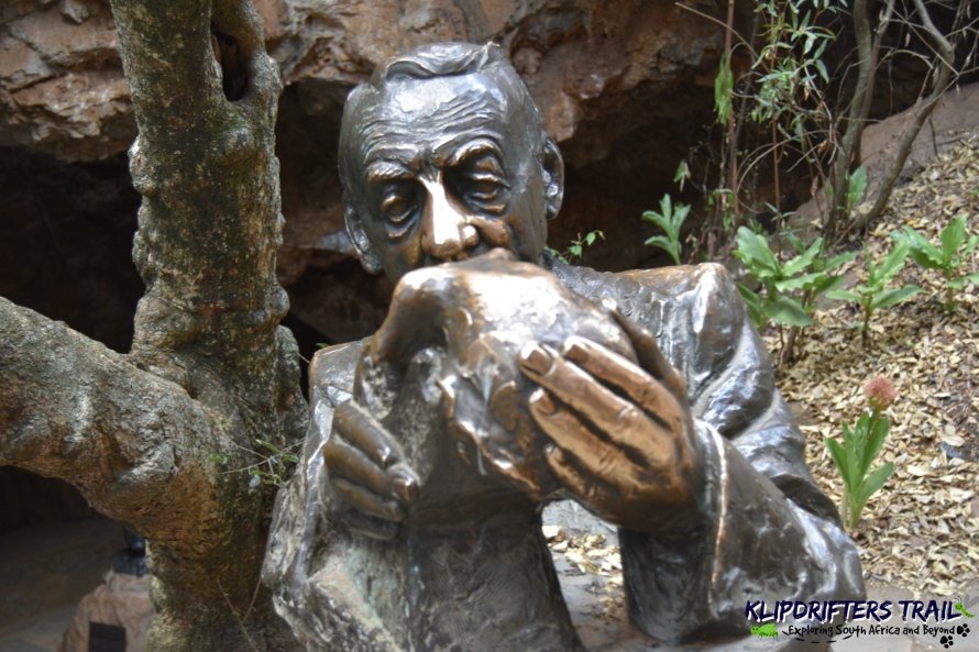 The statue of Dr.Bloom:Make a wise choice before following this legend at Sterkfontein Caves,South Africa.Read more at europediaries.com